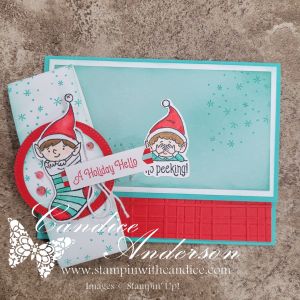 A Fun Fold Gift Card Holder featuring a playful elf design with a greeting that says 'A Holiday Hello' on a light blue background.