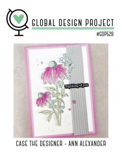 A card design featuring pink flowers and blue accents, with a stamped greeting saying 'Thinking of you,' framed by a gray vertical panel, and a pink border.