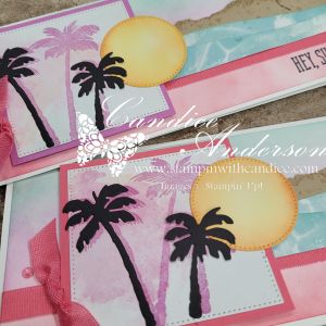 Two hand-crafted greeting cards featuring a watercolor background with pink and blue tones, silhouettes of palm trees, and a yellow sun.