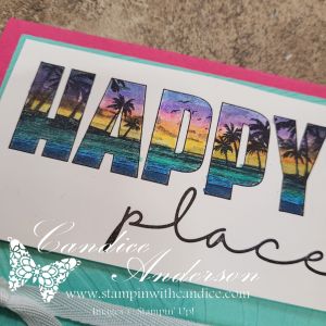 A colorful card featuring the words 'HAPPY place' with a sunset and palm tree design in the letters, set against a vibrant background.