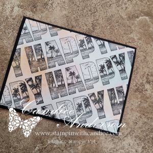 A greeting card featuring the word 'HAPPY' in a stylized font, surrounded by palm tree and beach imagery with a gradient background.