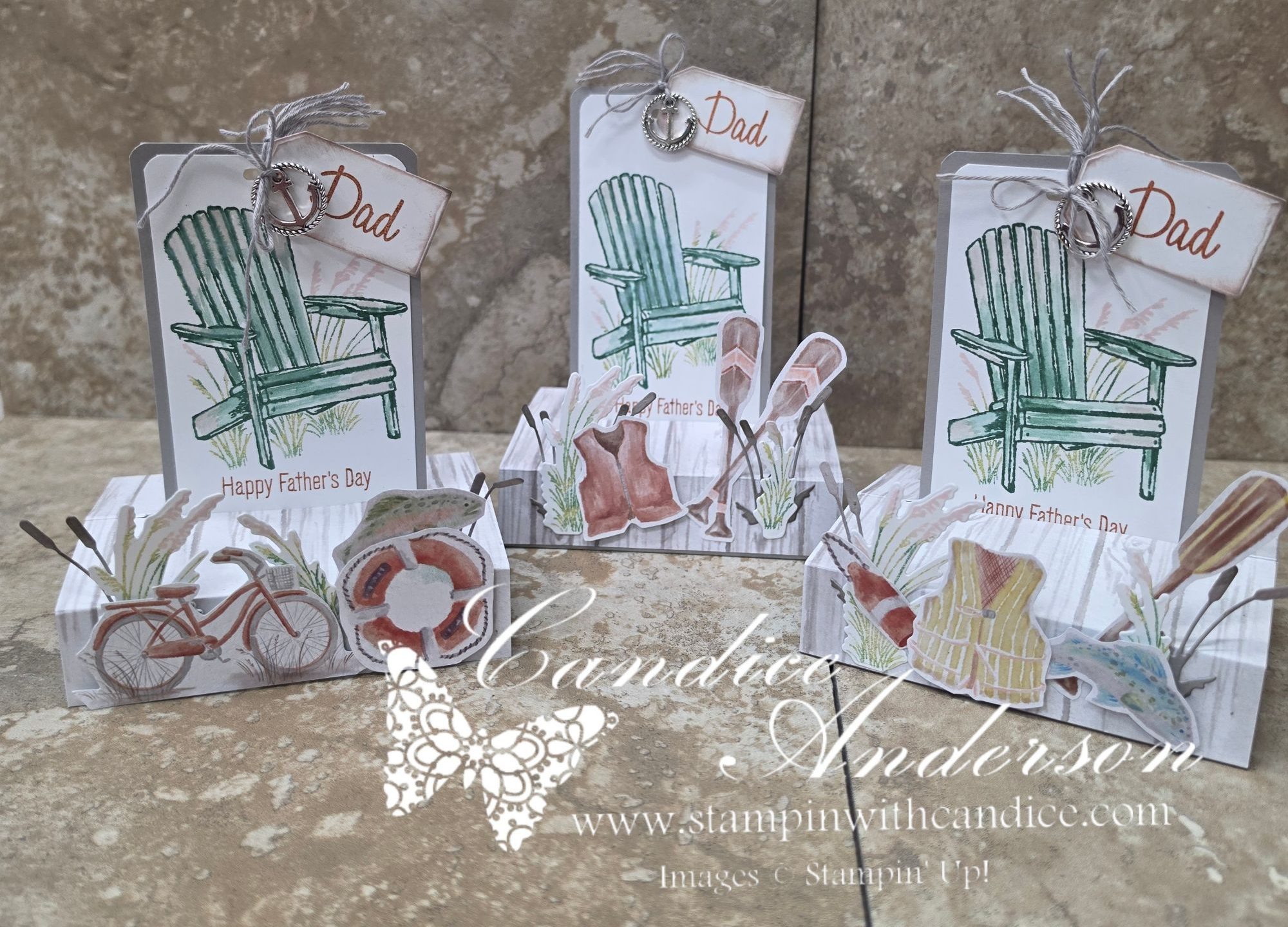 A collection of handmade Father's Day cards featuring a green Adirondack chair, various outdoor-themed decorations like a bicycle, life ring, fishing gear, and the text 'Happy Father's Day' on a white background.